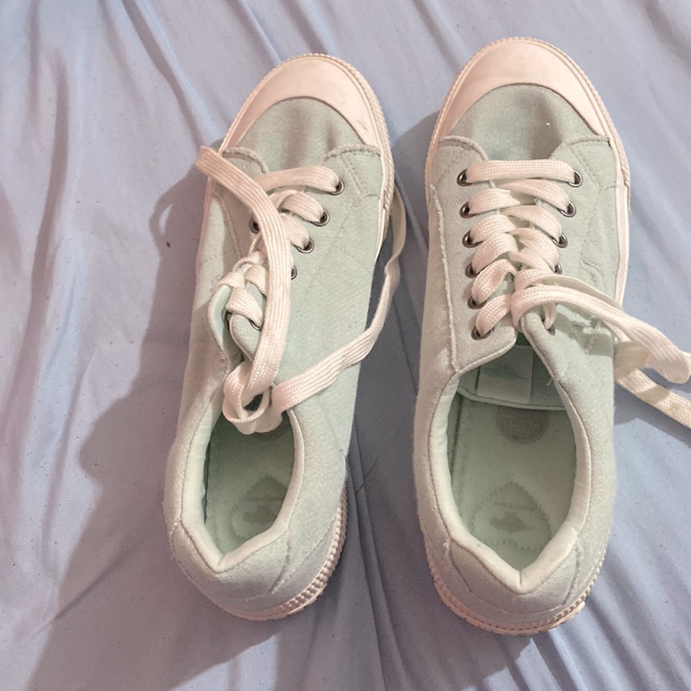 White and teal shoes